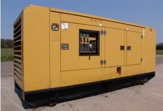 a yellow generator on a road